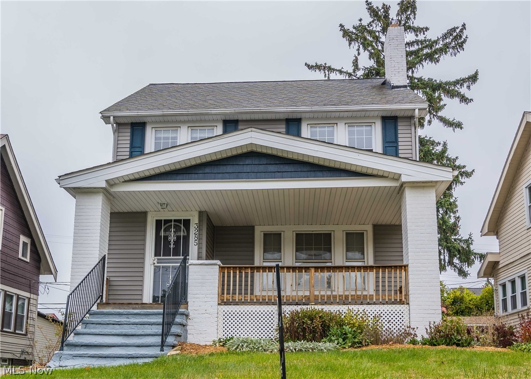 Great curb appeal - newer siding, front porch & railing. That porch extends across the width of the house and is wide! The front door opens to cute little vestibule to help with energy savings as you welcome family & friends to your home.