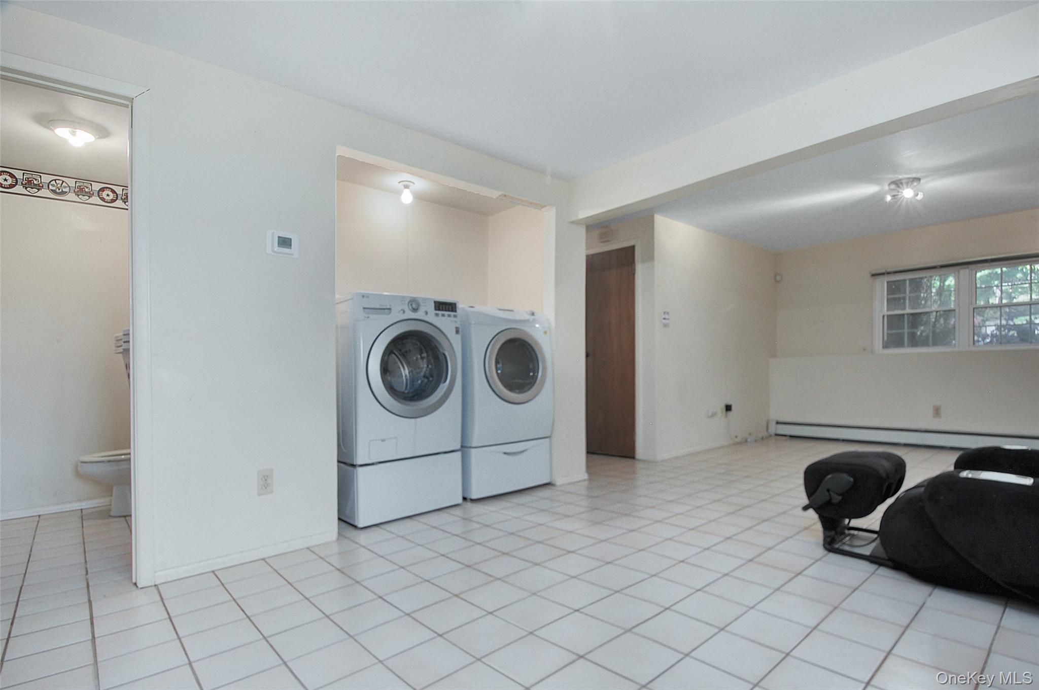 554 High Street Monroe, NY 10950 - Photo 28 of 29 a utility room with dryer and washer
