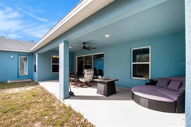 a building outdoor space with patio furniture