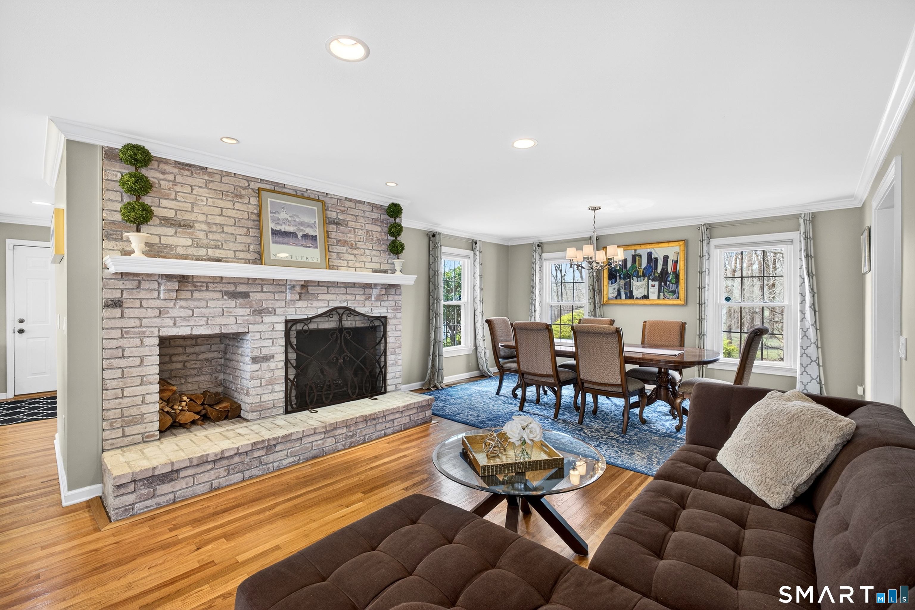 42 Great Hill Road Ridgefield, CT 06877 - Photo 13 of 40 Sitting Room with Wood burning Fireplace off Kitchen