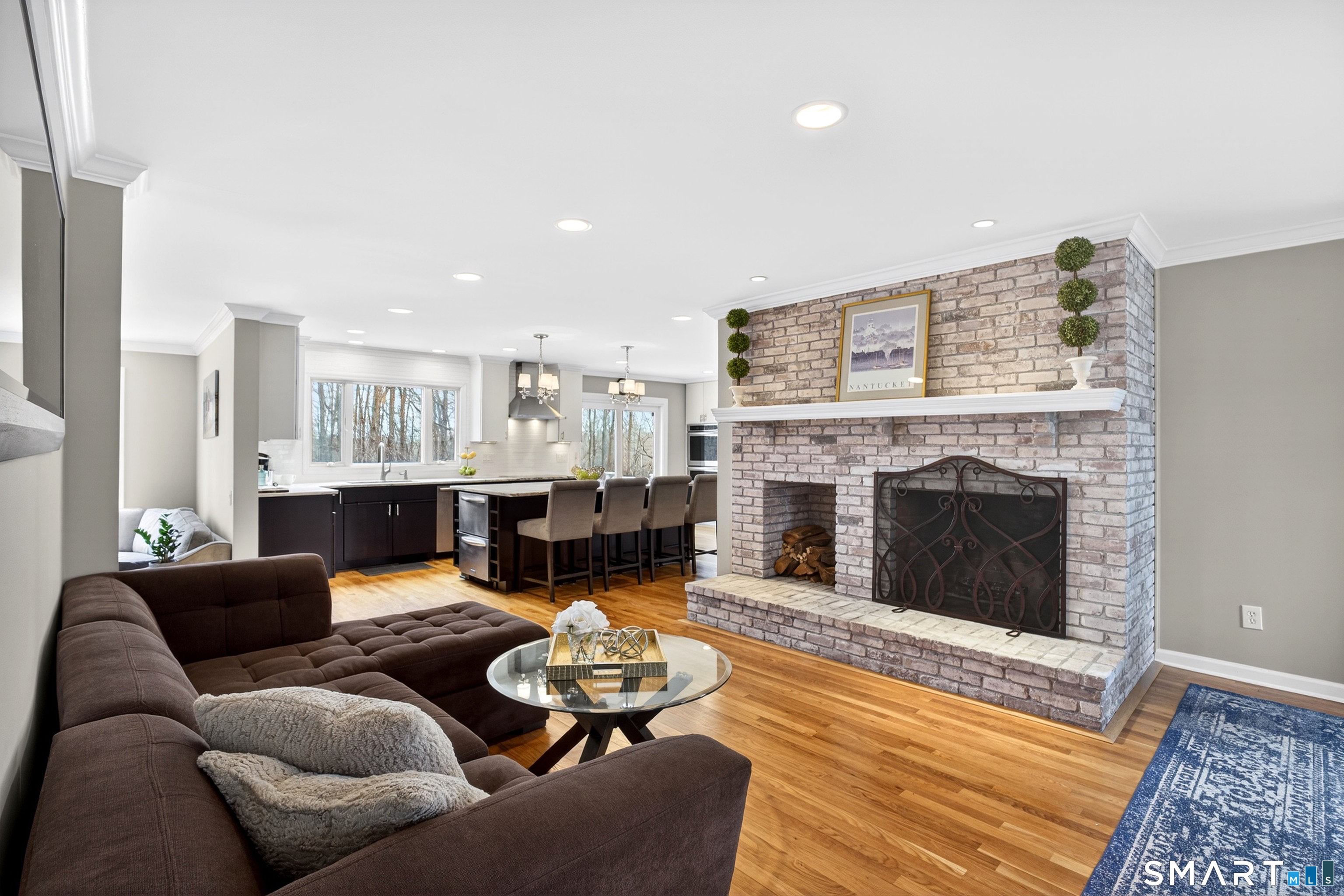 42 Great Hill Road Ridgefield, CT 06877 - Photo 14 of 40 Sitting Room with Wood burning Fireplace off Kitchen