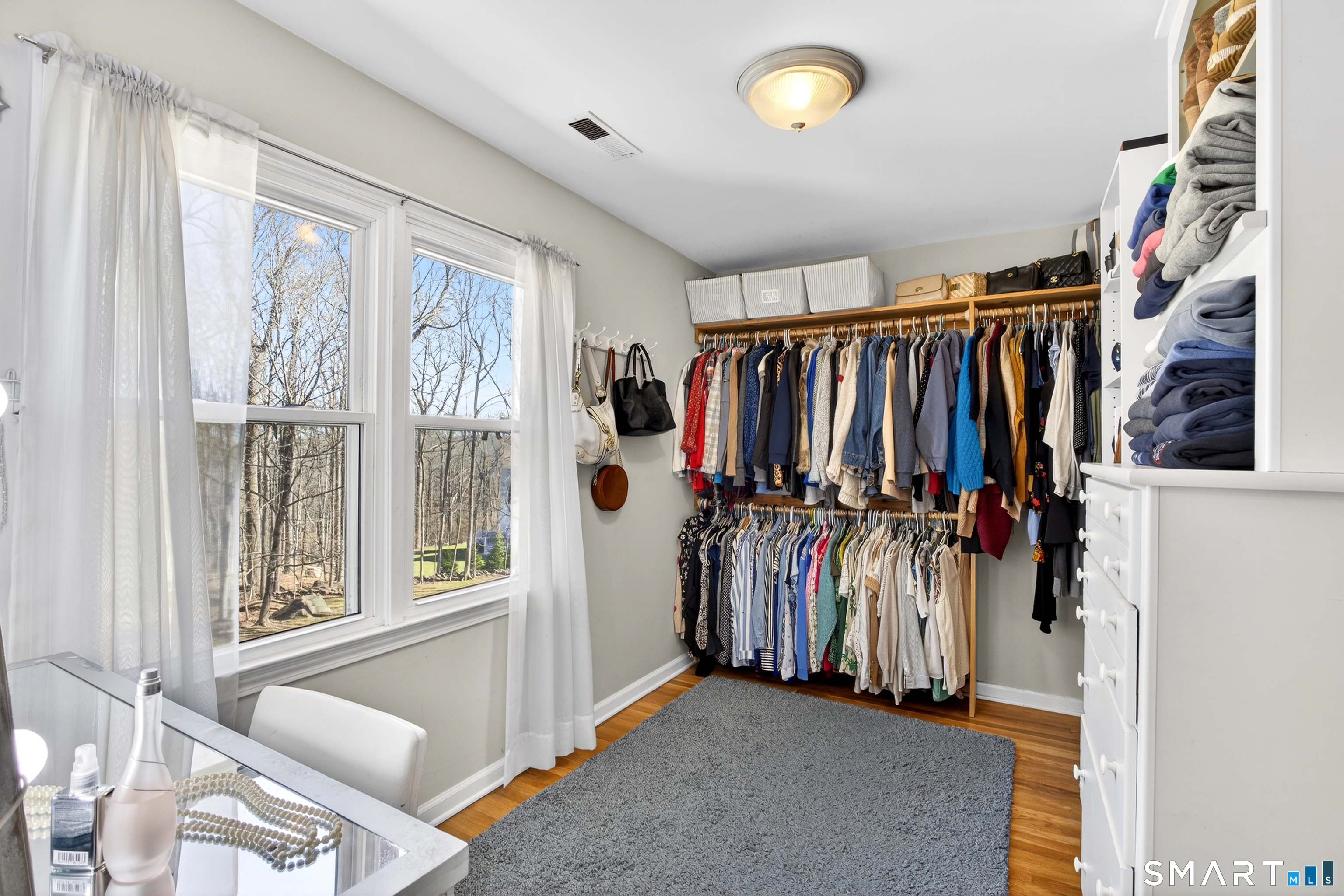 42 Great Hill Road Ridgefield, CT 06877 - Photo 26 of 40 Spacious Walk in Closet and Dressing Area in Primary Bedroom