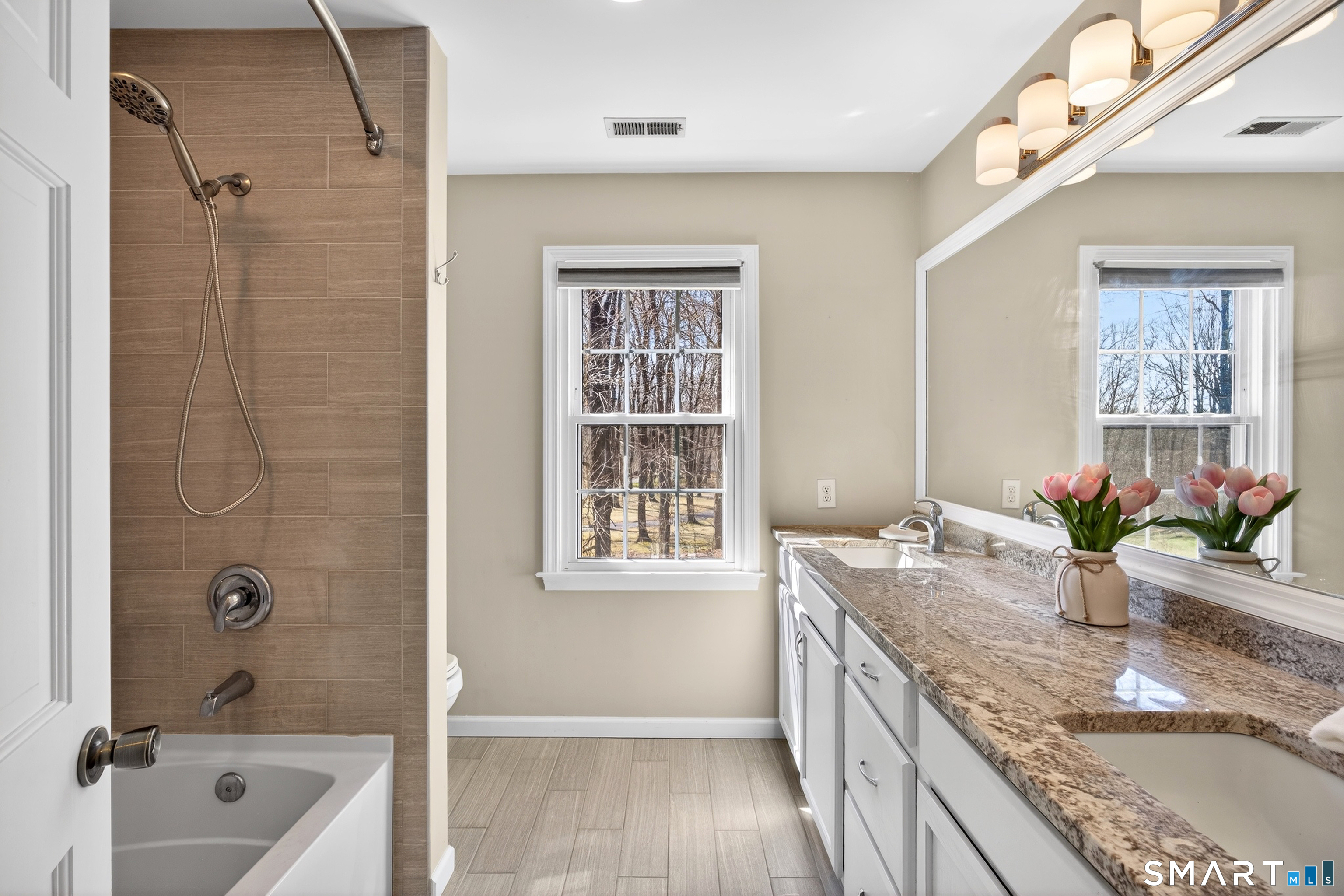 42 Great Hill Road Ridgefield, CT 06877 - Photo 28 of 40 Hall bathroom with tub and shower