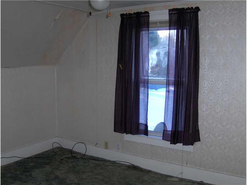 70 Pleasant Street Milo, ME 04463 - Photo 7 of 10 Master Bedroom.