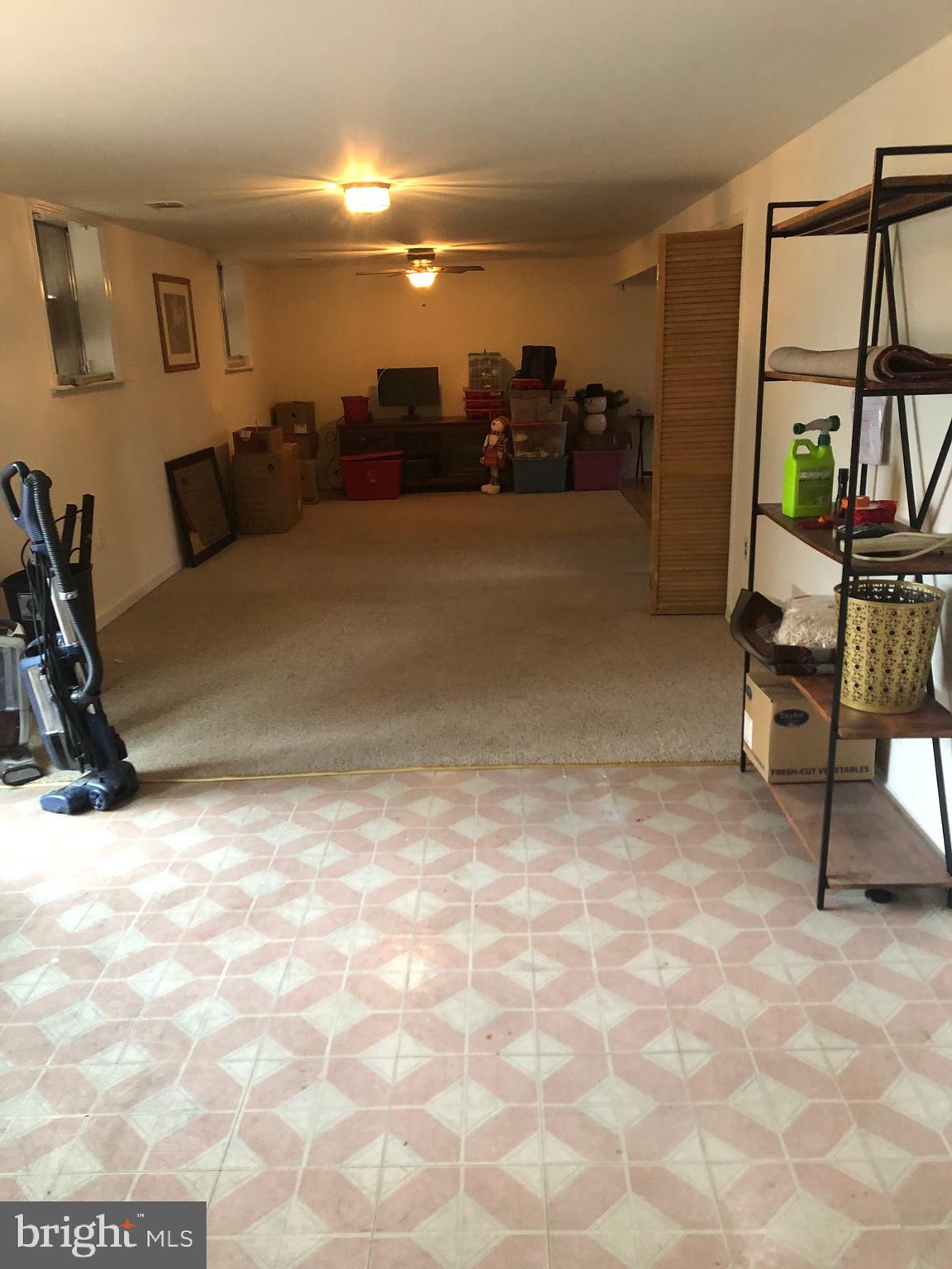 201 Southwood Road Pasadena, MD 21122 - Photo 15 of 16 a view of a livingroom with furniture and a flat screen tv
