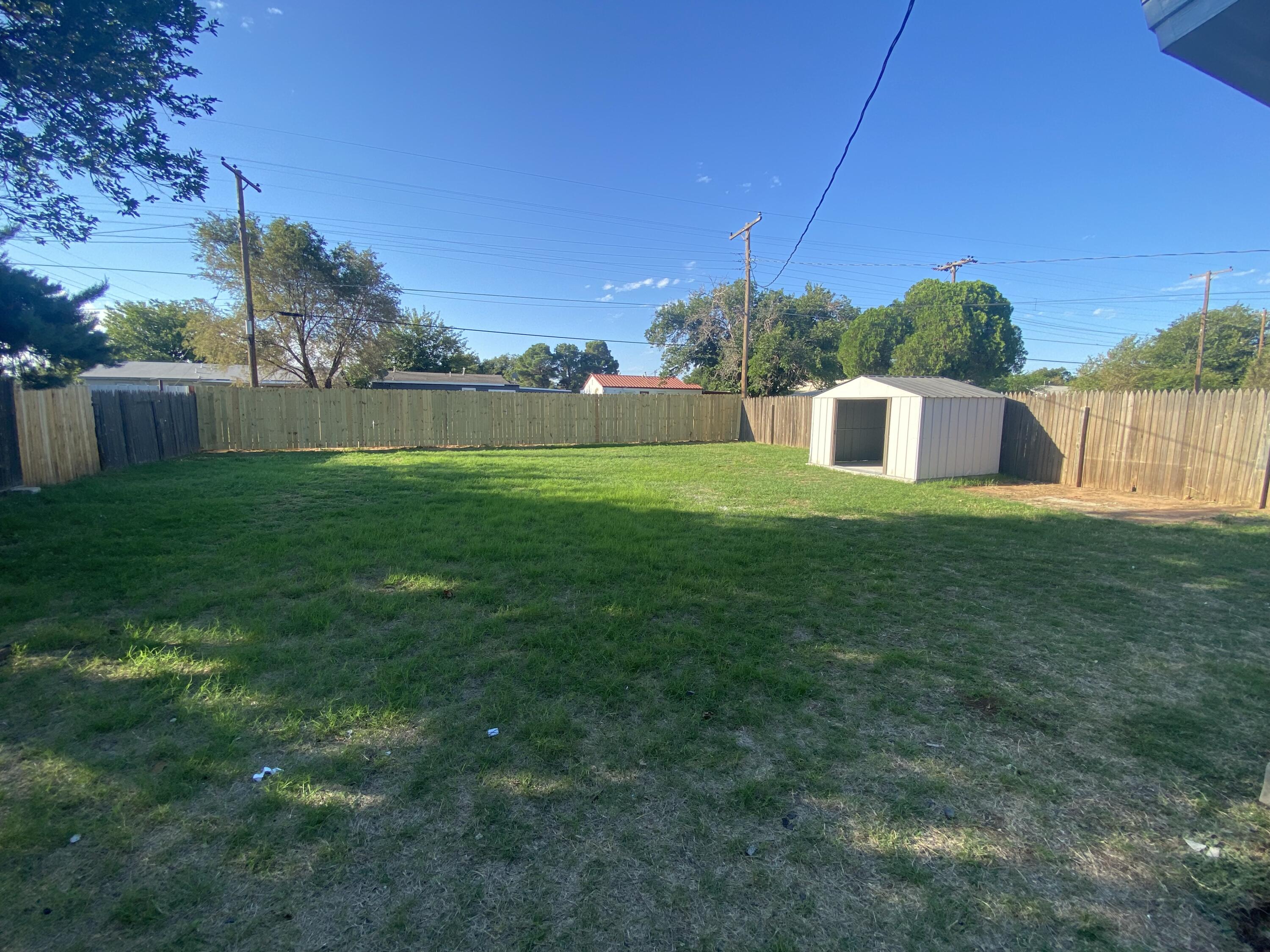 4603 45th Street Lubbock, TX 79414 - Photo 7 of 7 a view of a house with a yard