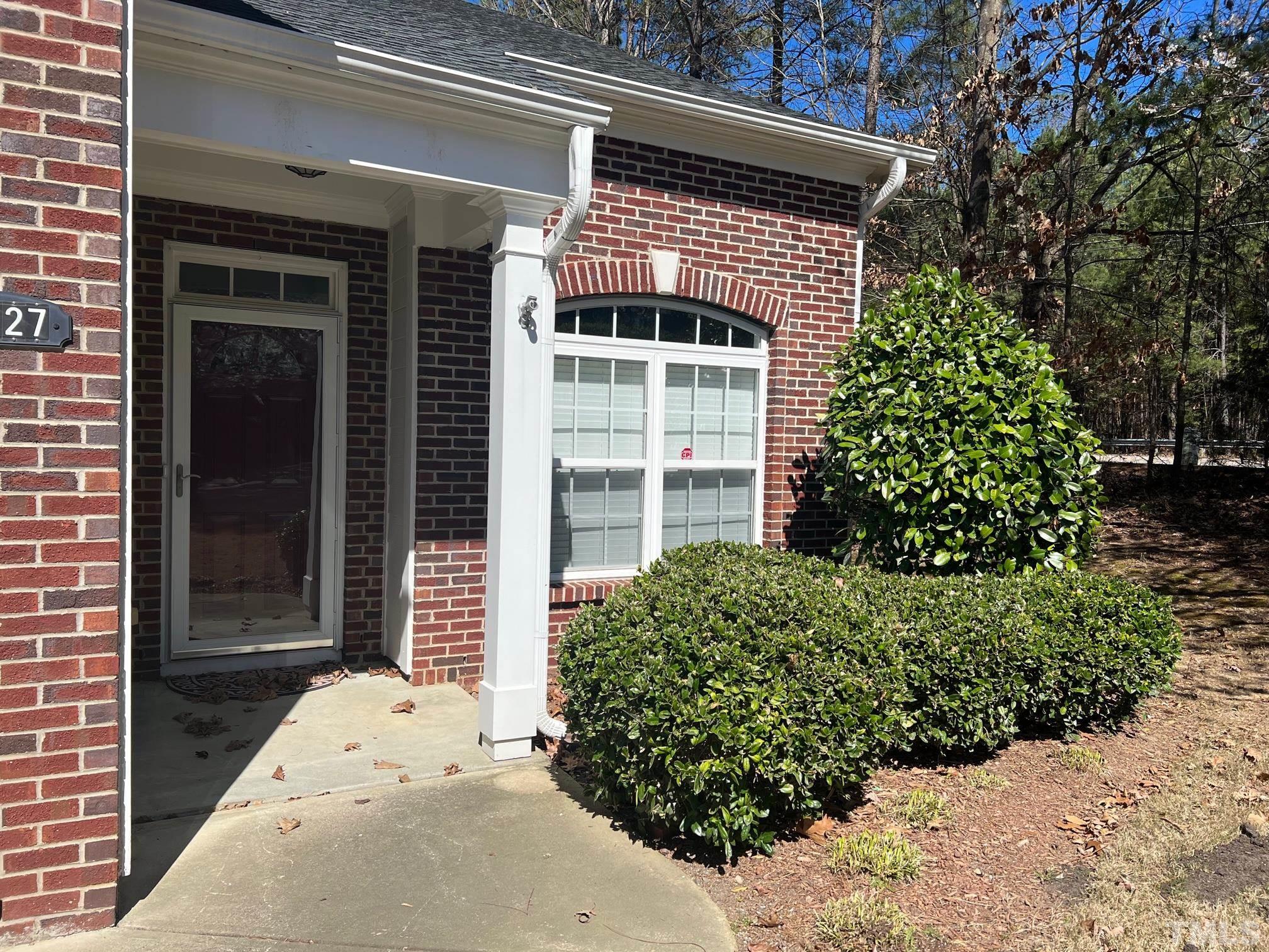 10527 Dapping Drive Raleigh, NC 27614 - Photo 1 of 20 a front view of a house with a yard and garage