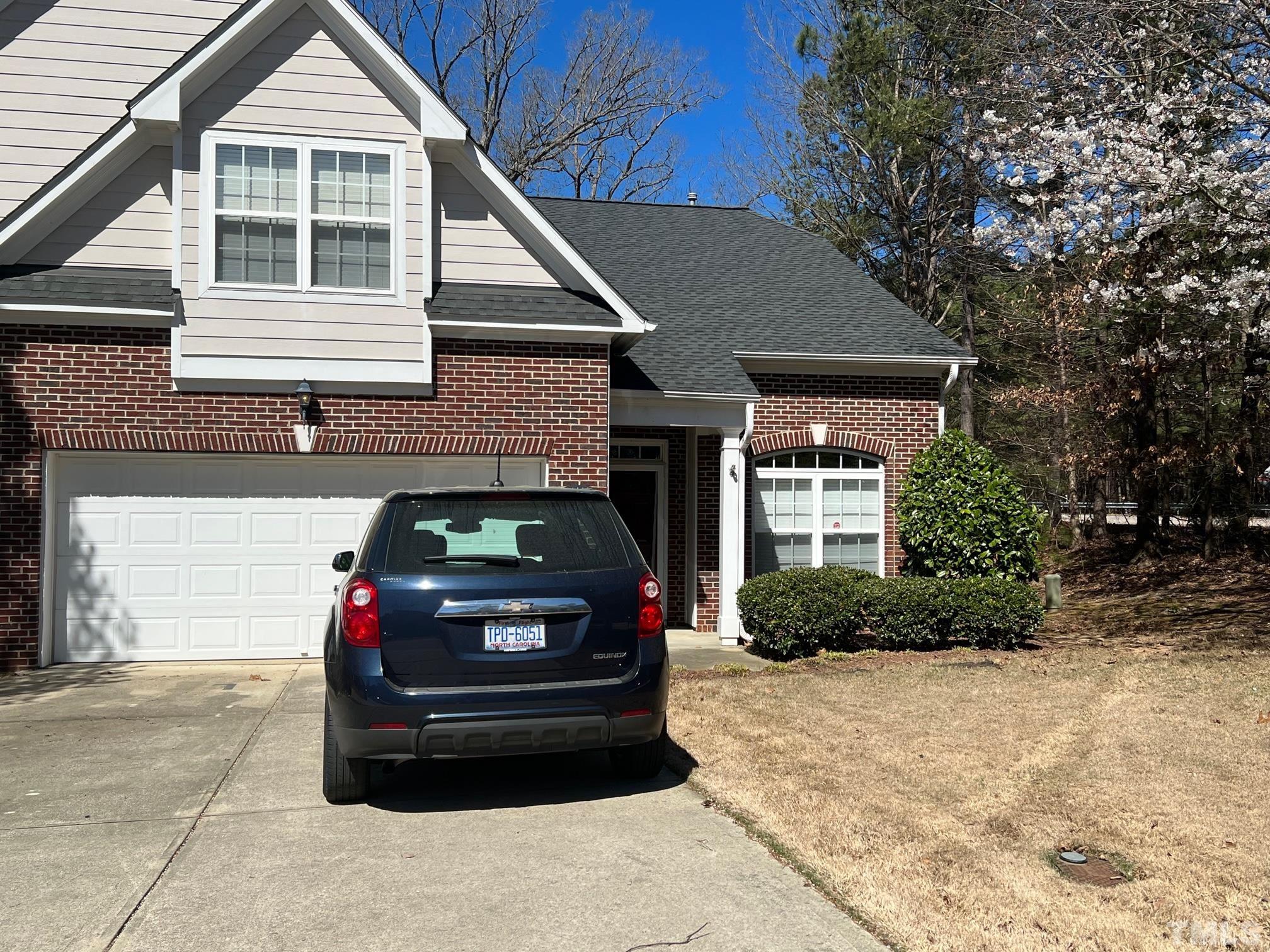 10527 Dapping Drive Raleigh, NC 27614 - Photo 2 of 20 a car parked in front of a house