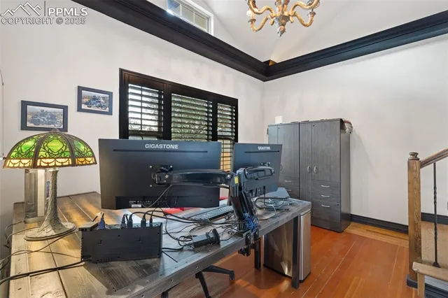 a workspace with furniture and window