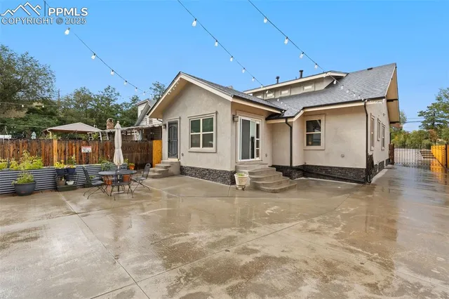 a aerial view of a house with a swimming pool