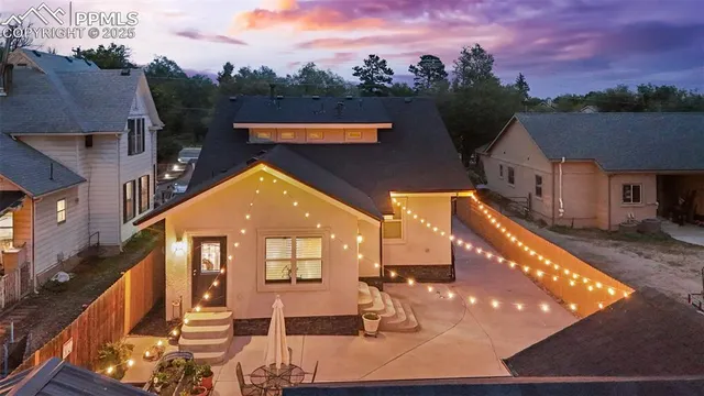 a view of a house and yard in the back yard