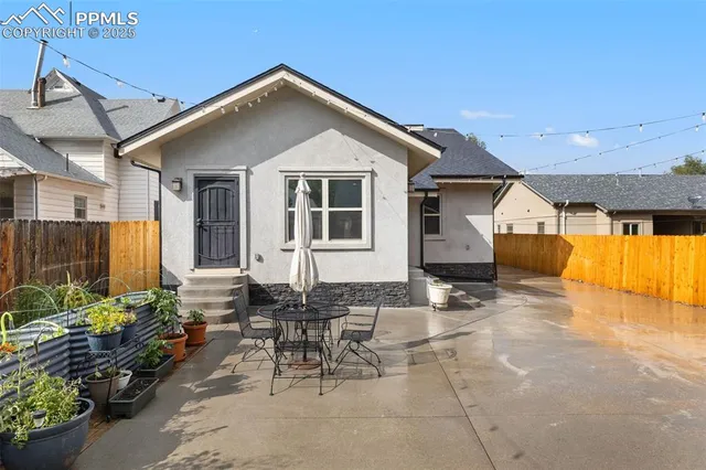a front view of a house with patio