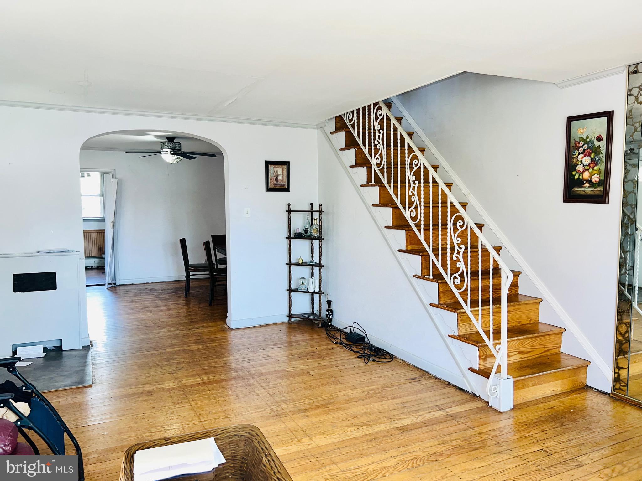1113 Gilham Street Philadelphia, PA 19111 - Photo 3 of 9 a view of entryway and hall with wooden floor