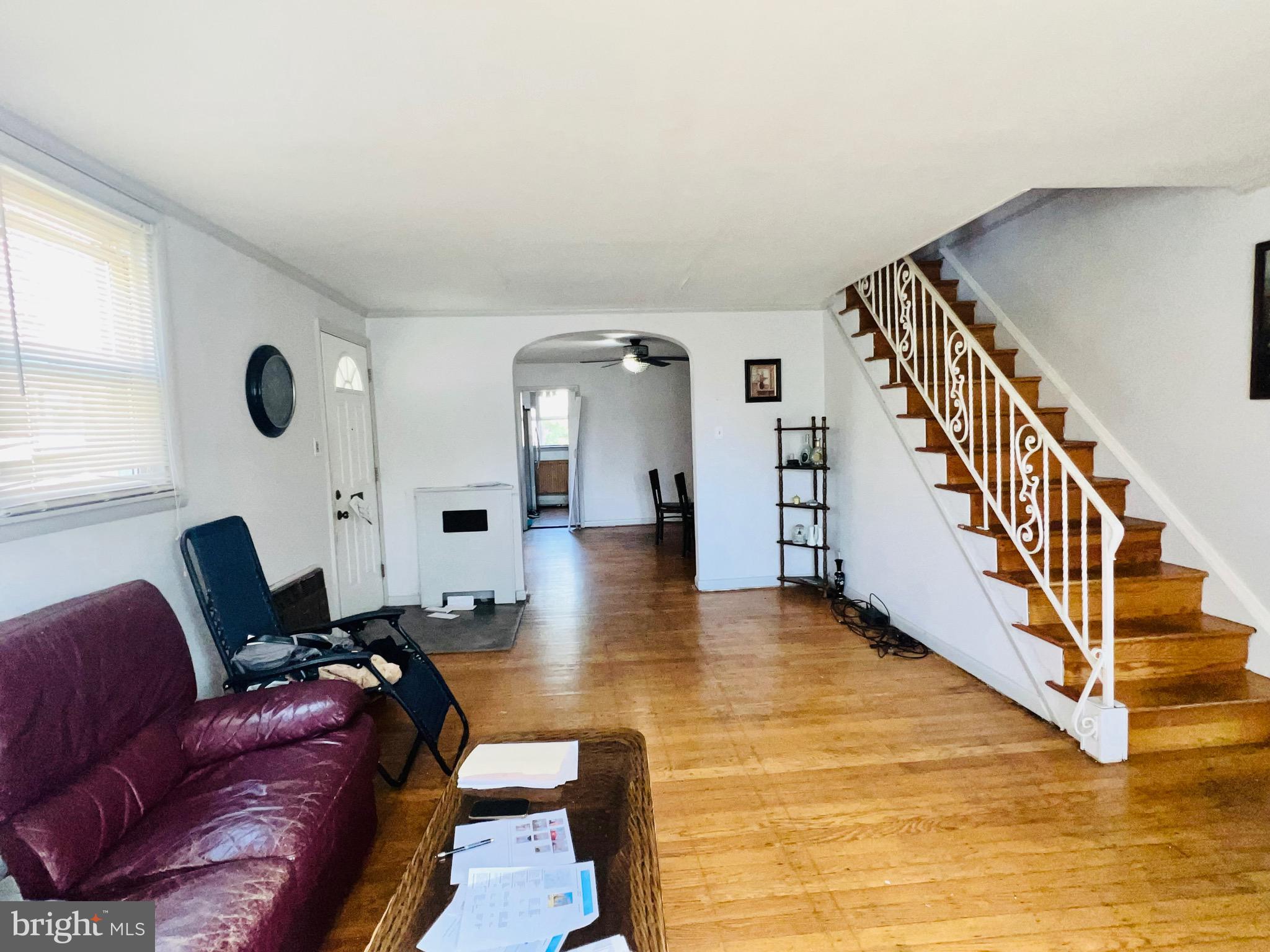 1113 Gilham Street Philadelphia, PA 19111 - Photo 4 of 9 a living room with furniture and stairs