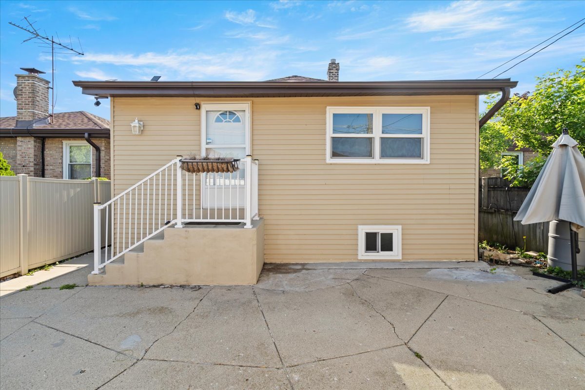 3111 Ruby Street Franklin Park, IL 60131 - Photo 24 of 27 a view of a house with backyard and sitting area