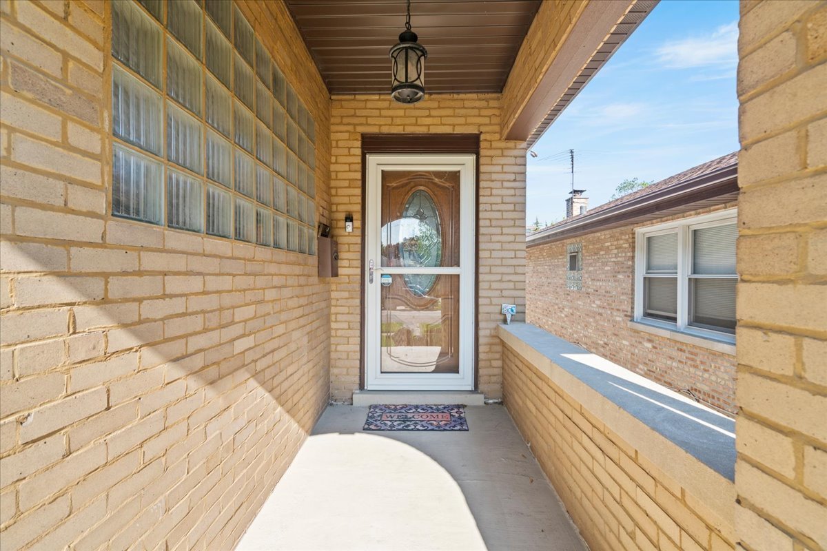 3111 Ruby Street Franklin Park, IL 60131 - Photo 3 of 27 a view of a hallway with a outdoor space