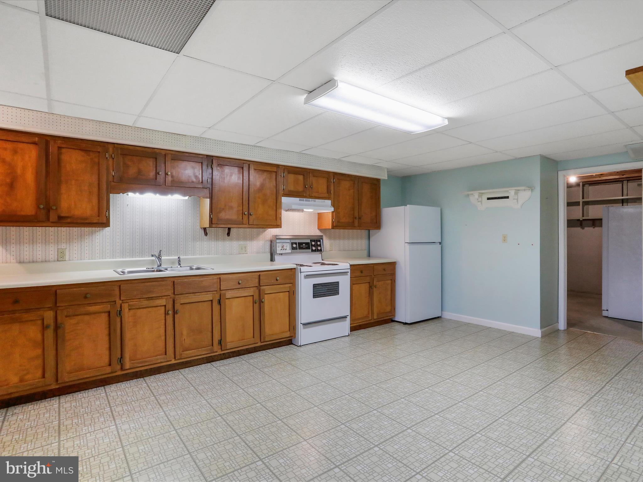 20036 Landis Road Hagerstown, MD 21740 - Photo 68 of 75 Functional second kitchen in basement.