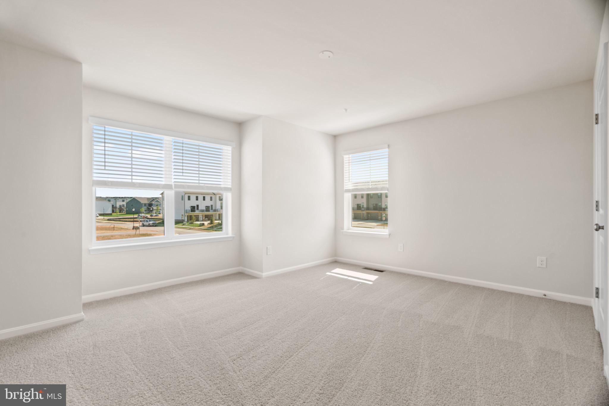 449 Ensemble Way Frederick, MD 21701 - Photo 26 of 64 an empty room with windows