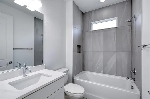 a view of a kitchen with a sink and a stove top oven
