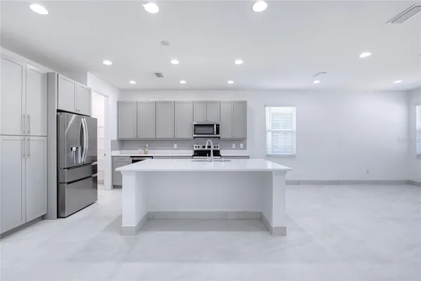 a view of storage and utility room with racks on the wall