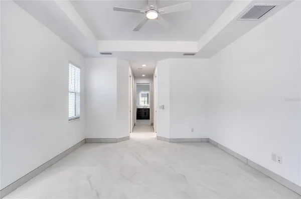 a view of a swimming pool and an outdoor space