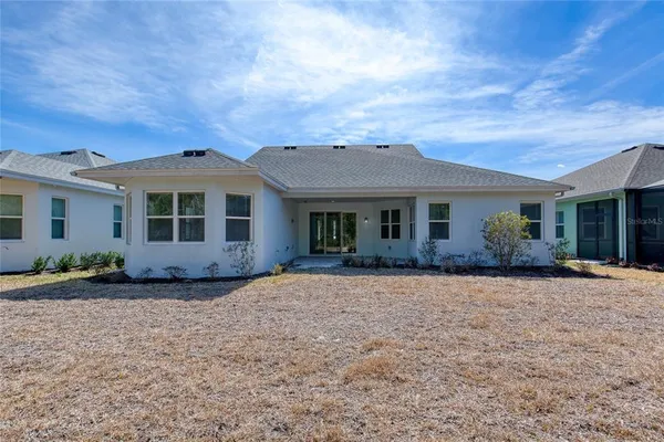 an aerial view of a highlighted house