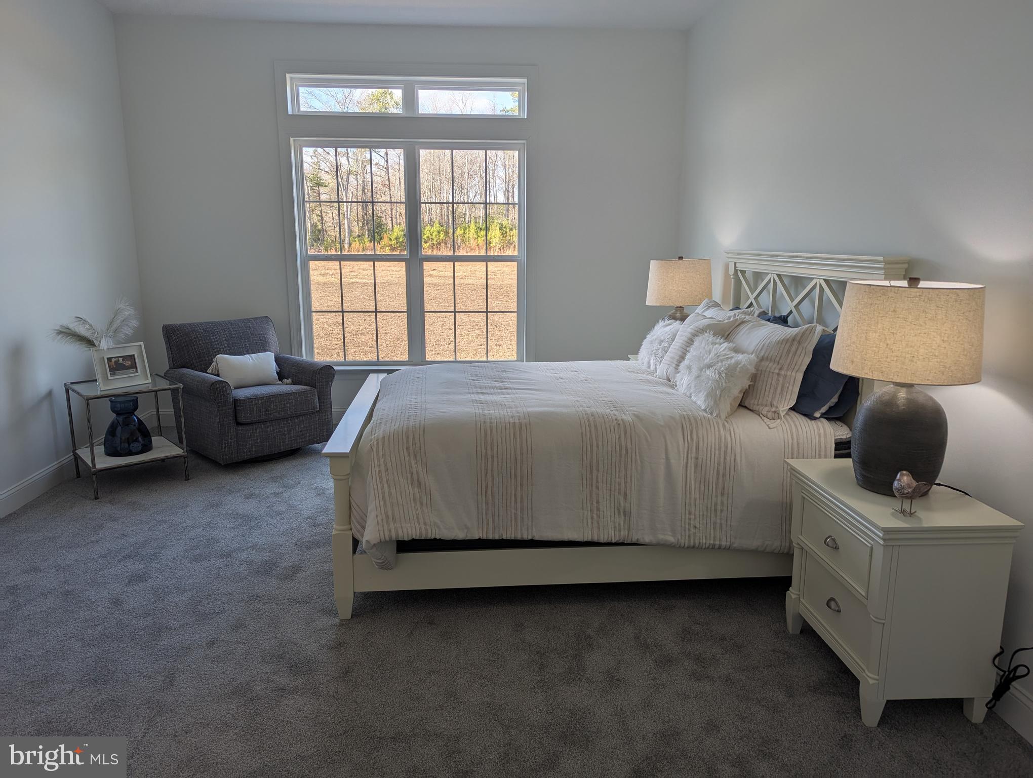 20727 Wilson Road Georgetown, DE 19947 - Photo 13 of 40 a bedroom with a bed and a window