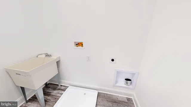 a bathroom with a sink and tub