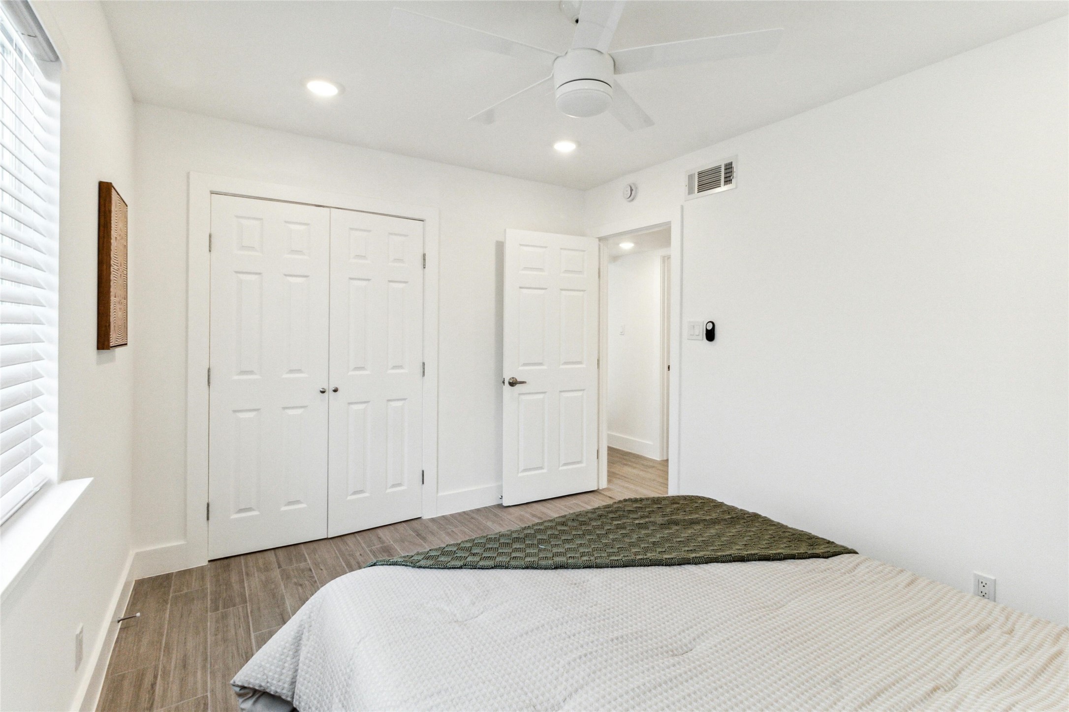 1200 East 52nd Street, Unit 101 Austin, TX 78723 - Photo 11 of 17 a bedroom with a bed and a window