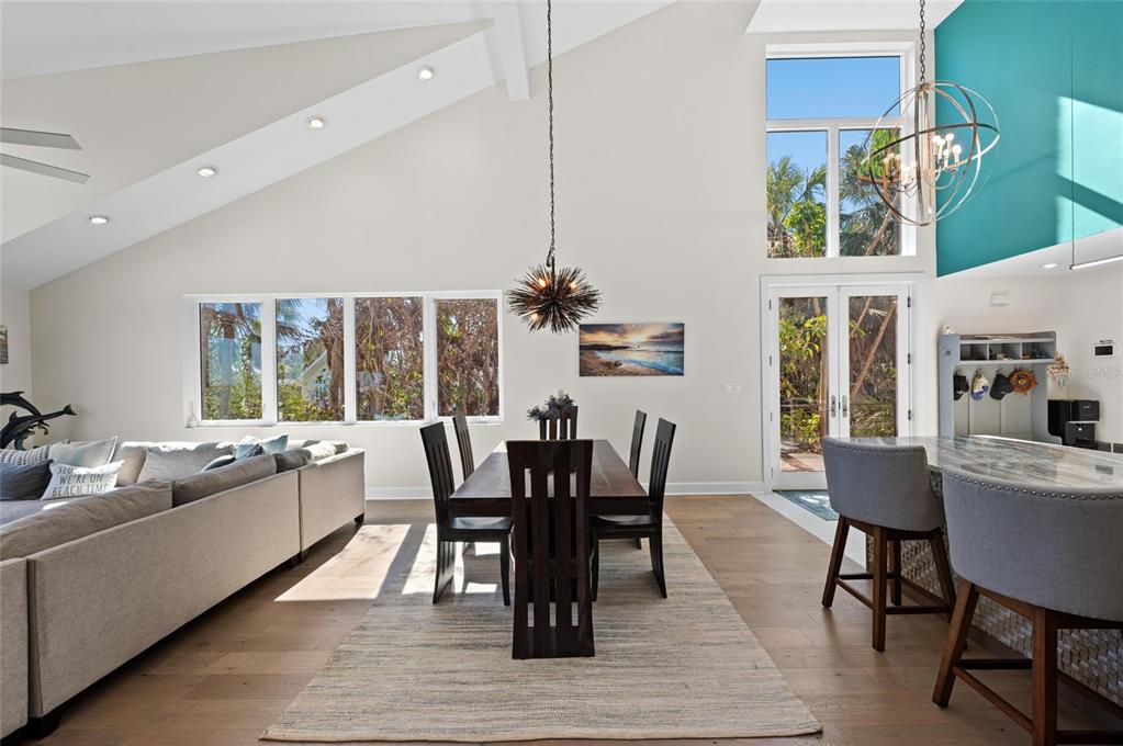 140 North Casey Key Road Osprey, FL 34229 - Photo 23 of 91 a view of a dining room with furniture window and outside view