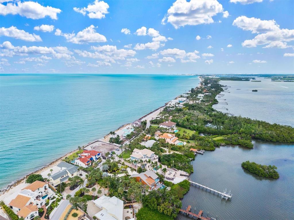140 North Casey Key Road Osprey, FL 34229 - Photo 68 of 91 a view of a lake with a yard