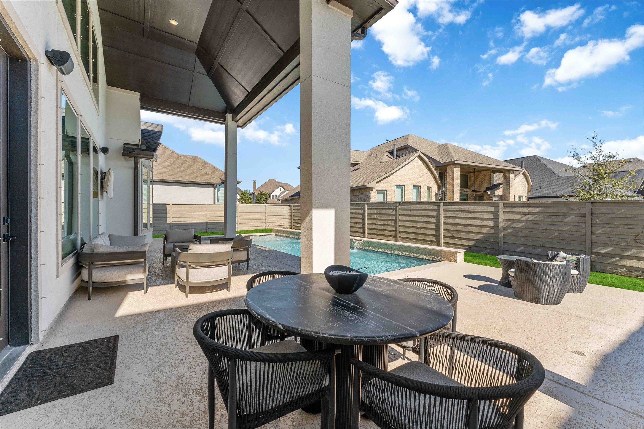 4315 Sandy Cv Drive Manvel, TX 77578 - Photo 41 of 50 Experience seamless indoor-outdoor living with a Sonos sound system, perfect for relaxation and entertainment.