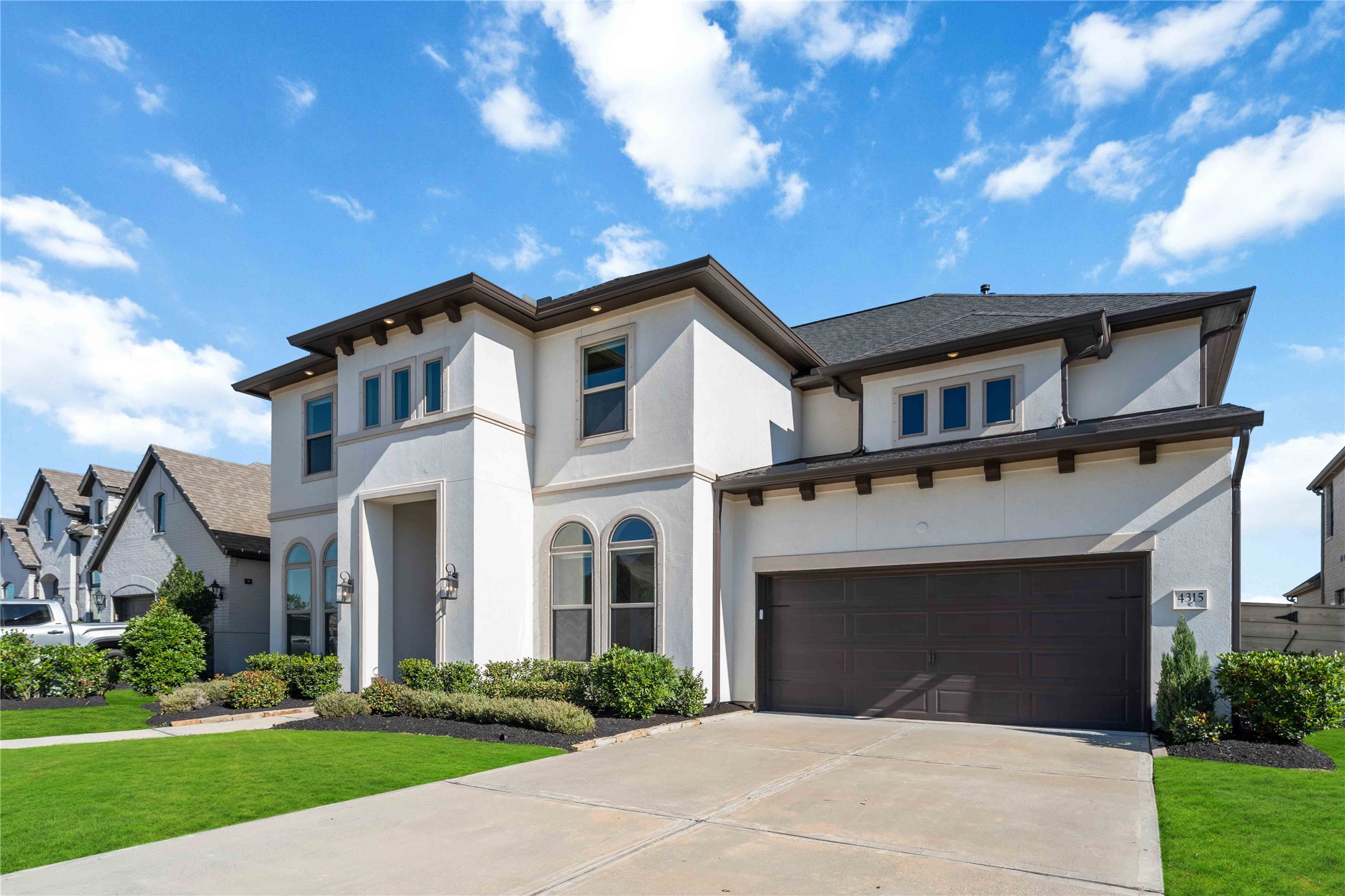 4315 Sandy Cv Drive Manvel, TX 77578 - Photo 47 of 50 Complete stucco exterior, spacious driveway with a 3 car tandem garage.