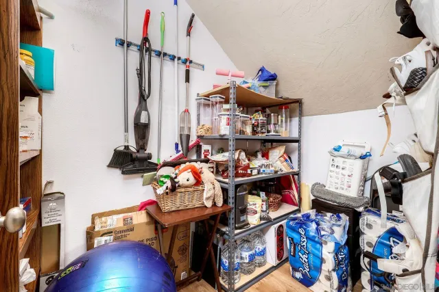 a room with furniture and a wooden floor