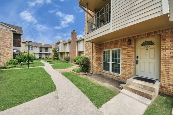 a view of a backyard with garage