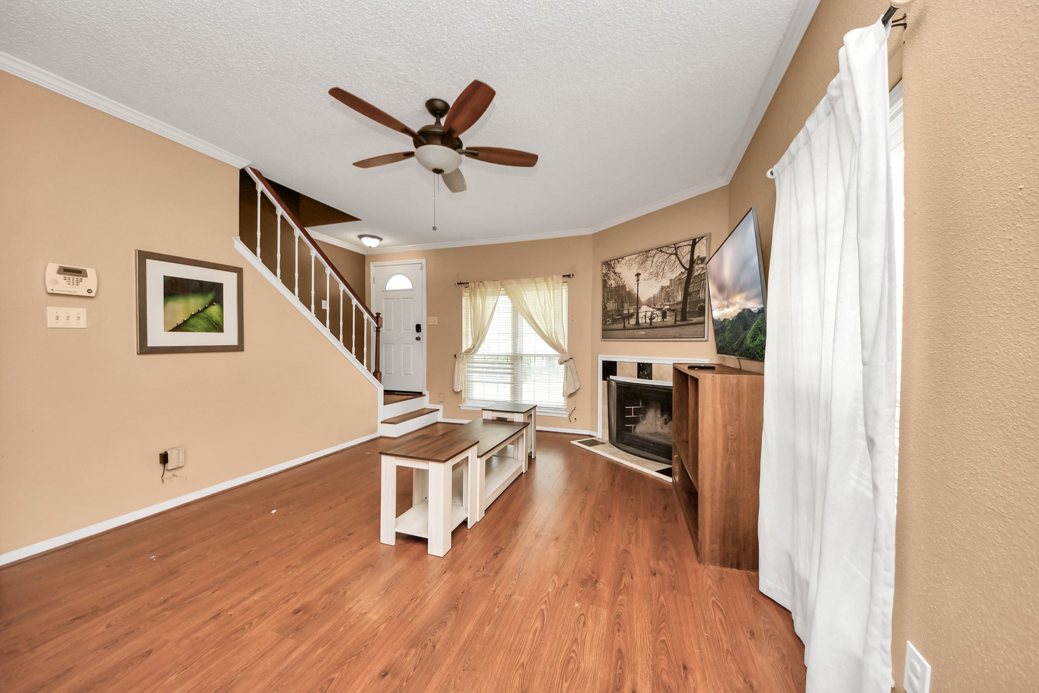 3600 Jeanetta Street, Unit 1804 Houston, TX 77063 - Photo 9 of 40 a living room with furniture and a fireplace
