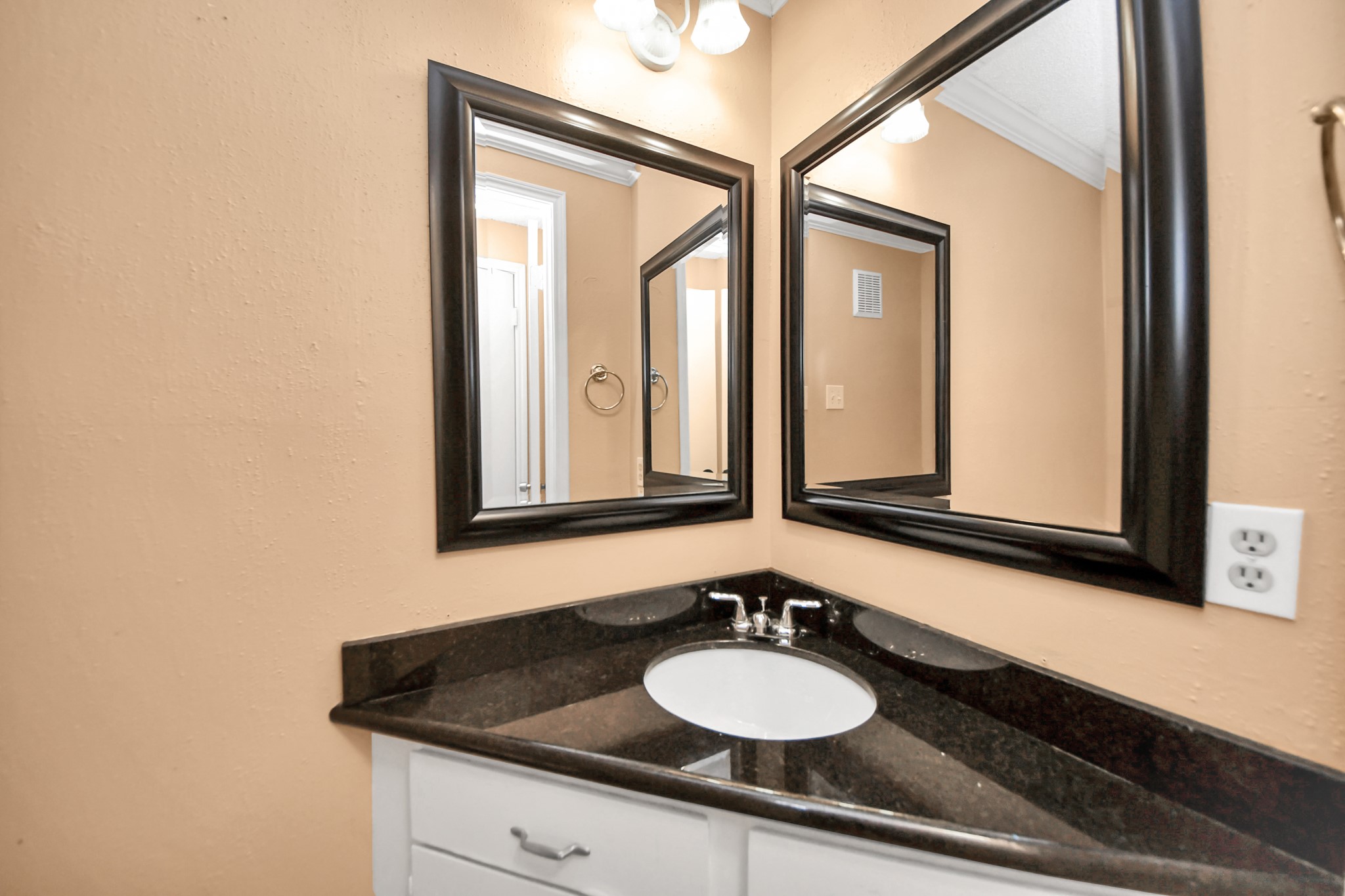 3600 Jeanetta Street, Unit 1804 Houston, TX 77063 - Photo 10 of 40 a bathroom with a sink and a mirror