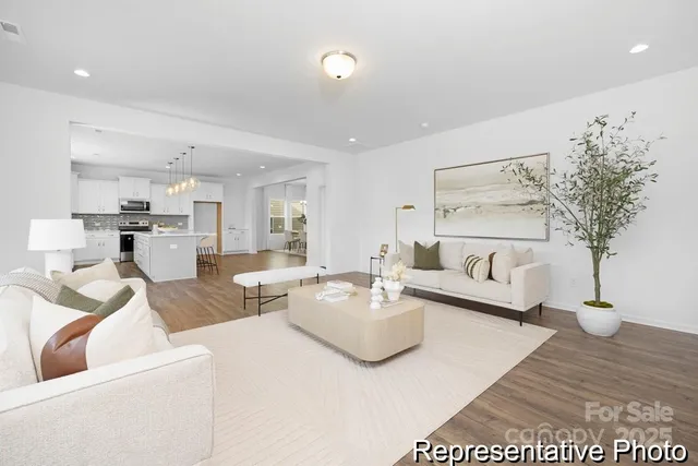 a living room with furniture and a table