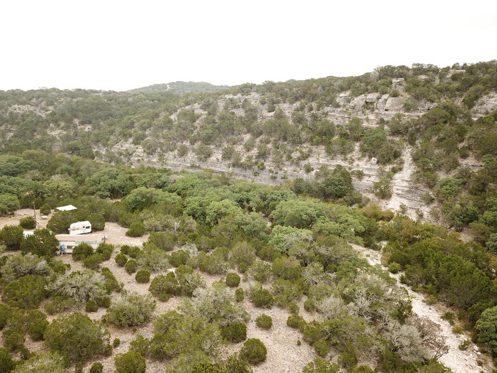 2521 Sd 31600 Rocksprings, TX 78880 - Photo 15 of 58 a view of a forest with mountains in the background