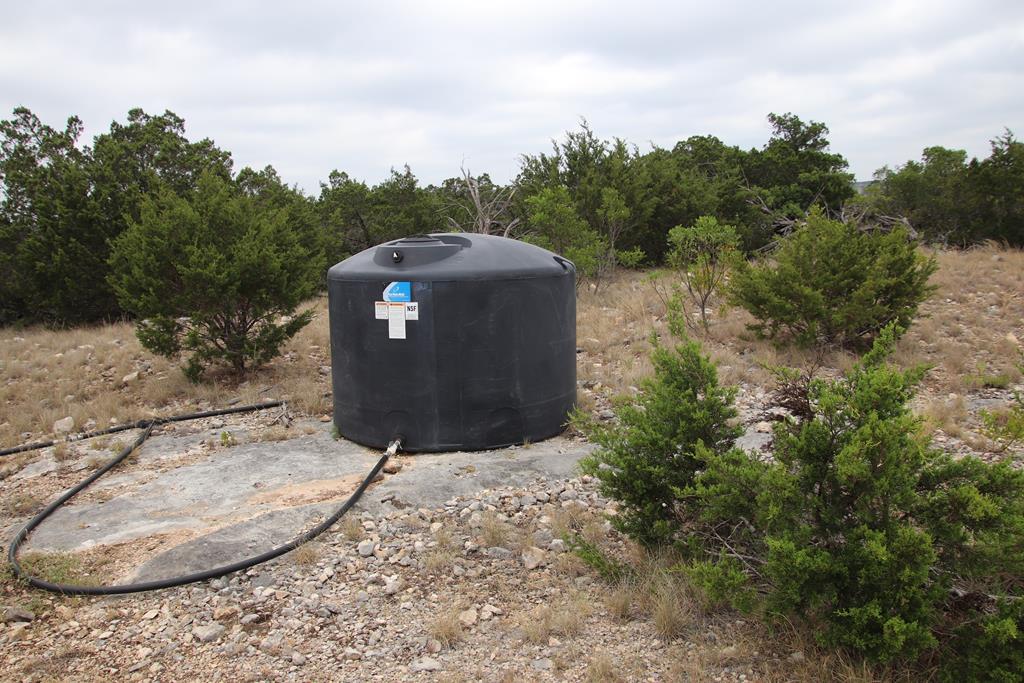 2521 Sd 31600 Rocksprings, TX 78880 - Photo 53 of 58 a view of a wooden house with a bench