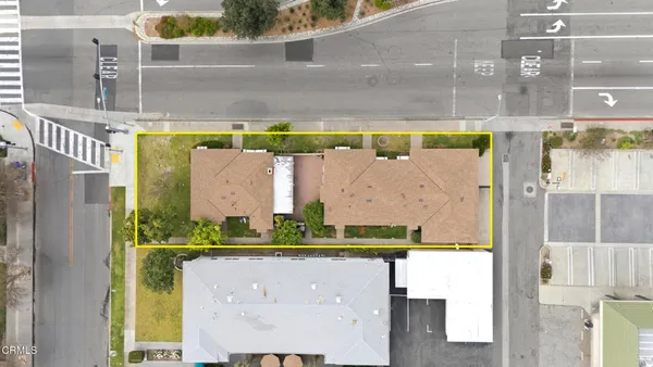 an aerial view of a house with a garden