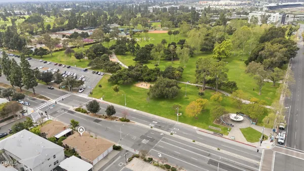 an aerial view of residential building with parking space