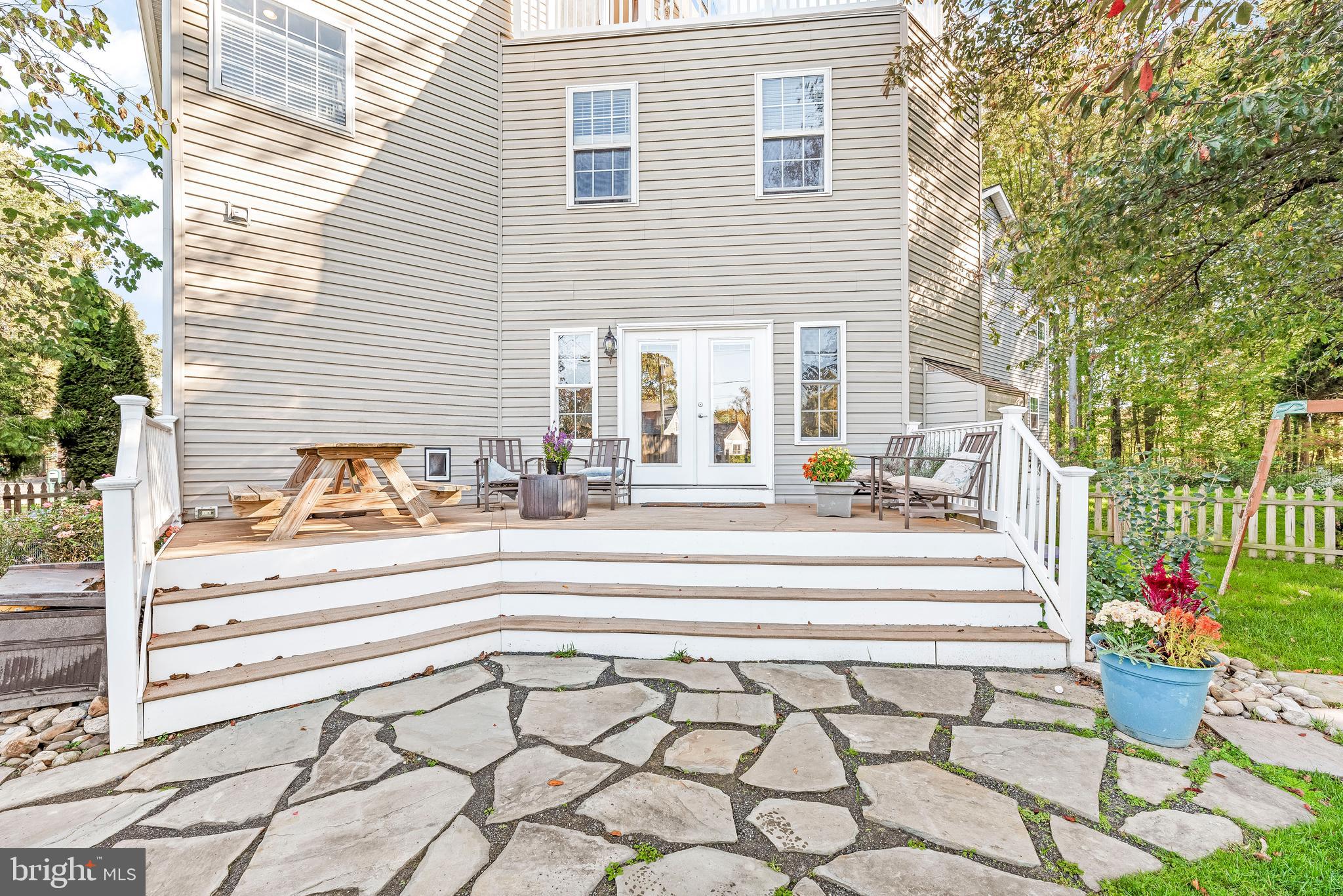 619 Park Place Deale, MD 20751 - Photo 54 of 64 Large deck and stone patio.