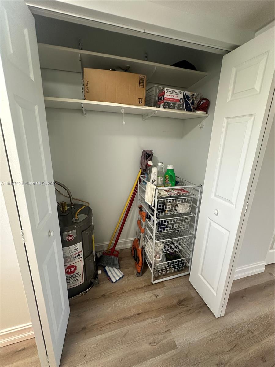 4027 Swansea Crescent, Unit 4027 Deerfield Beach, FL 33442 - Photo 20 of 47 a view of a hallway with closet