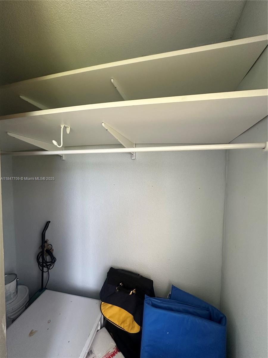 4027 Swansea Crescent, Unit 4027 Deerfield Beach, FL 33442 - Photo 22 of 47 a bathroom with a bathtub