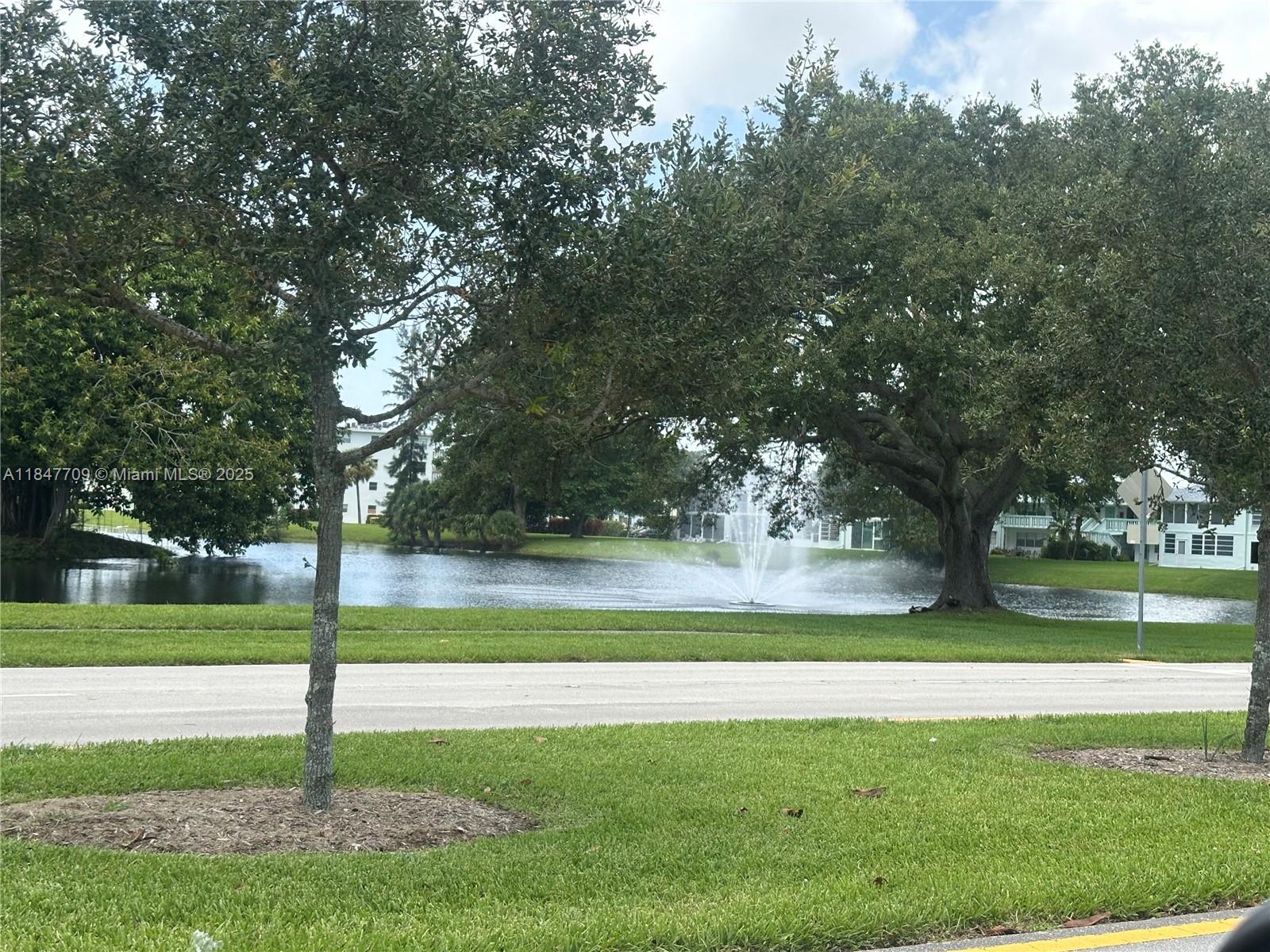 4027 Swansea Crescent, Unit 4027 Deerfield Beach, FL 33442 - Photo 42 of 47 a view of a park