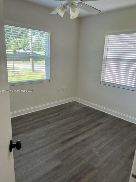 3524 Eagle Drive Orlando, FL 32804 - Photo 7 of 7 wooden floor in an empty room with a window