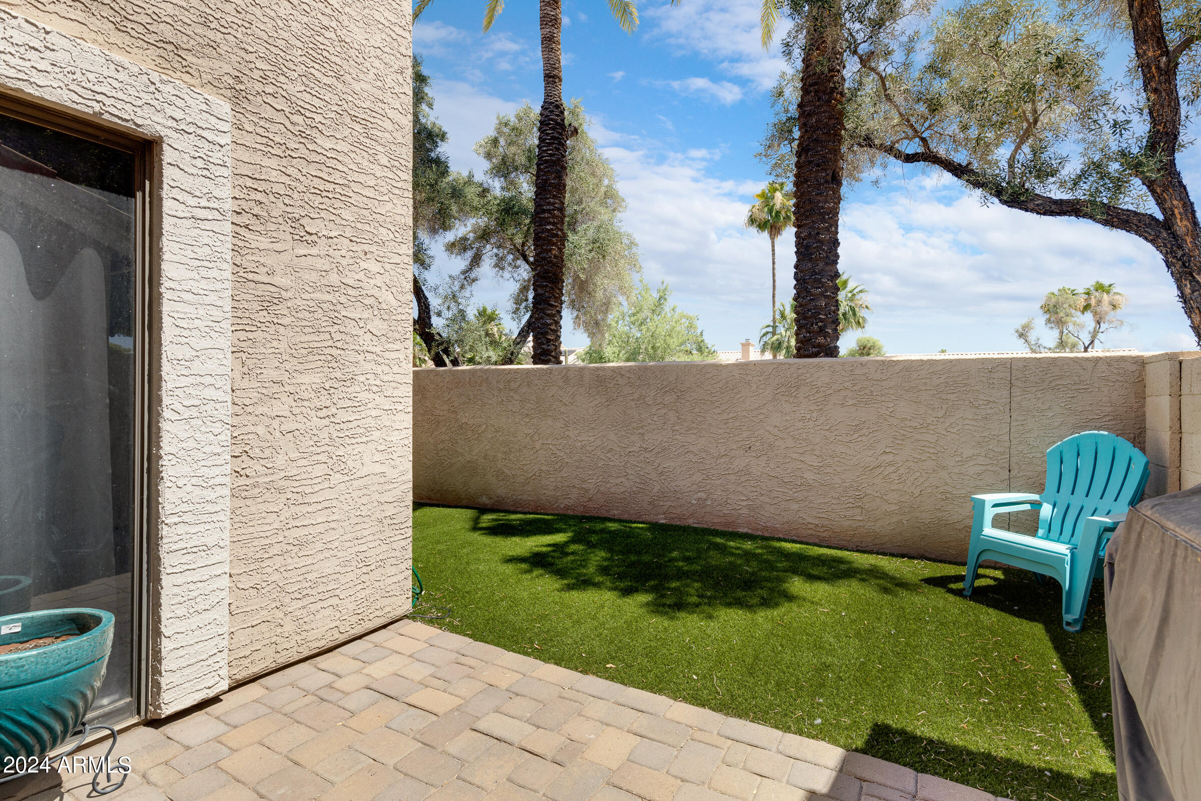 4142 East Agave Road Phoenix, AZ 85044 - Photo 28 of 30 a view of backyard with seating space