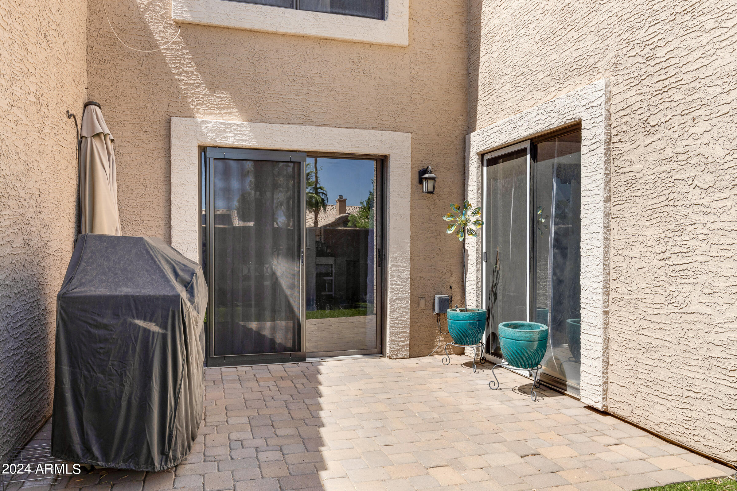 4142 East Agave Road Phoenix, AZ 85044 - Photo 30 of 30 a entryway view with a outdoor space