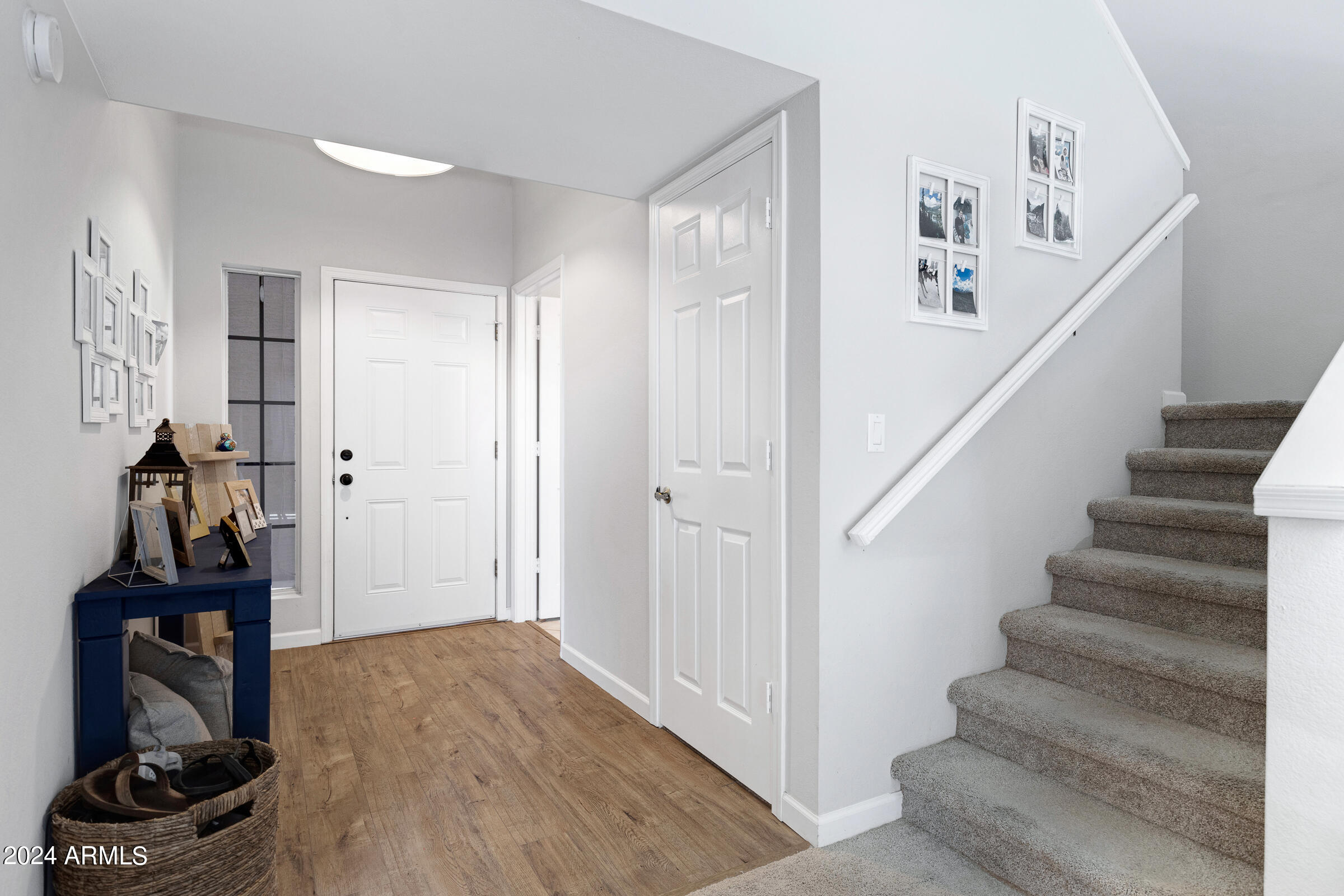 4142 East Agave Road Phoenix, AZ 85044 - Photo 6 of 30 a view of a hallway with room gym equipment